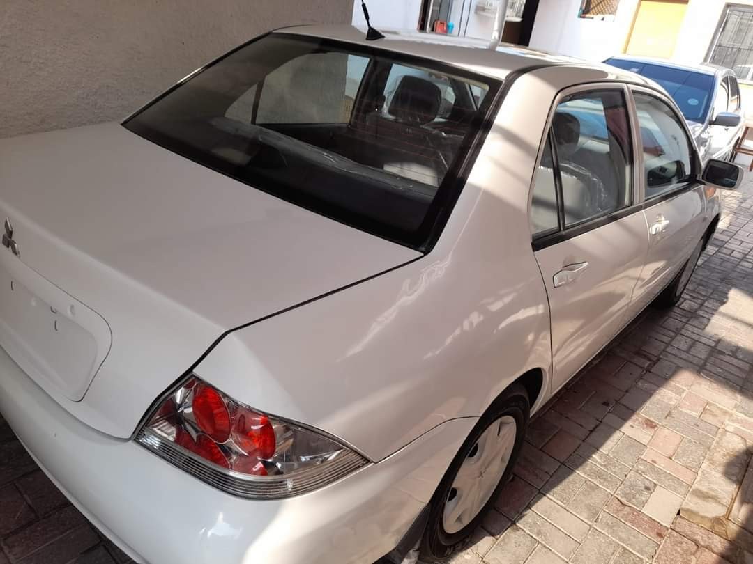 Mitsubishi Lancer 2010 for 7,000 aed